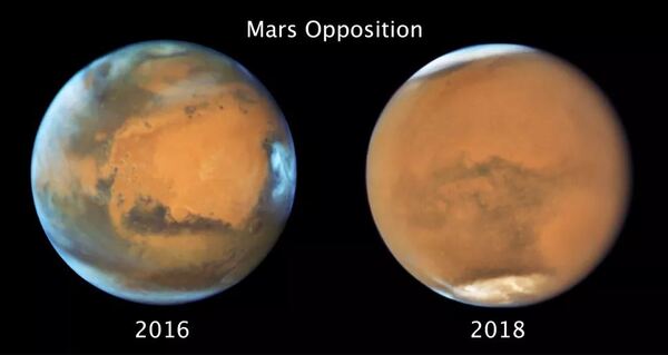 مقابلة المريخ تُظهر صور كوكب المريخ هذه مشهدًا مختلفًا لنفس نصف الكرة من الكوكب. التقطت الصورة التي على اليسار في شهر أيار/مايو 2016، وهي تُظهر غلافًا جويًا صافيًا، في حين تُظهر الصورة التي على اليمين الملتقطة في شهر يوليو/تموز 2018 العاصفة الترابية الكونية التي عطلت مسبار أوبورتونيتي. حقوق الصورة: NASA, ESA and STSci