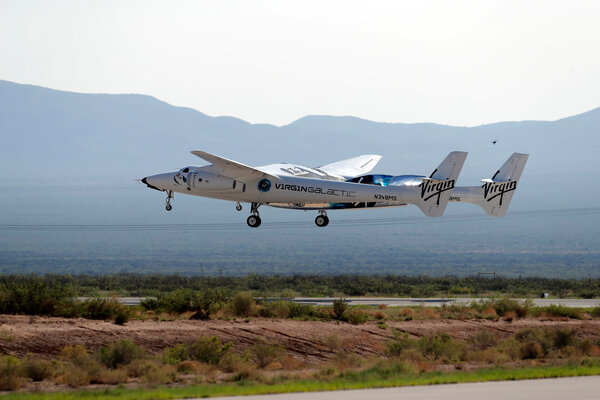 صورة للطائرة التي حملت مركبة يونيتي إلى ارتفاع 13 كيلومتر تقريباً من ميناء أمريكا الفضائي في نيو مكسيكو يوم الأحد 12 يوليو. حقوق الصورة: AP Photo/Andres Leighton
